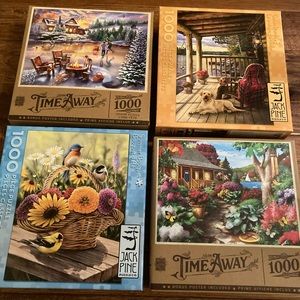 Lot of four 1000 piece Jigsaw puzzles
